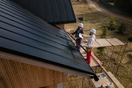 full-shot-roofers-working-with-helmets